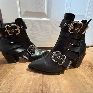 Adika Black Heeled Boots with Buckle Accents